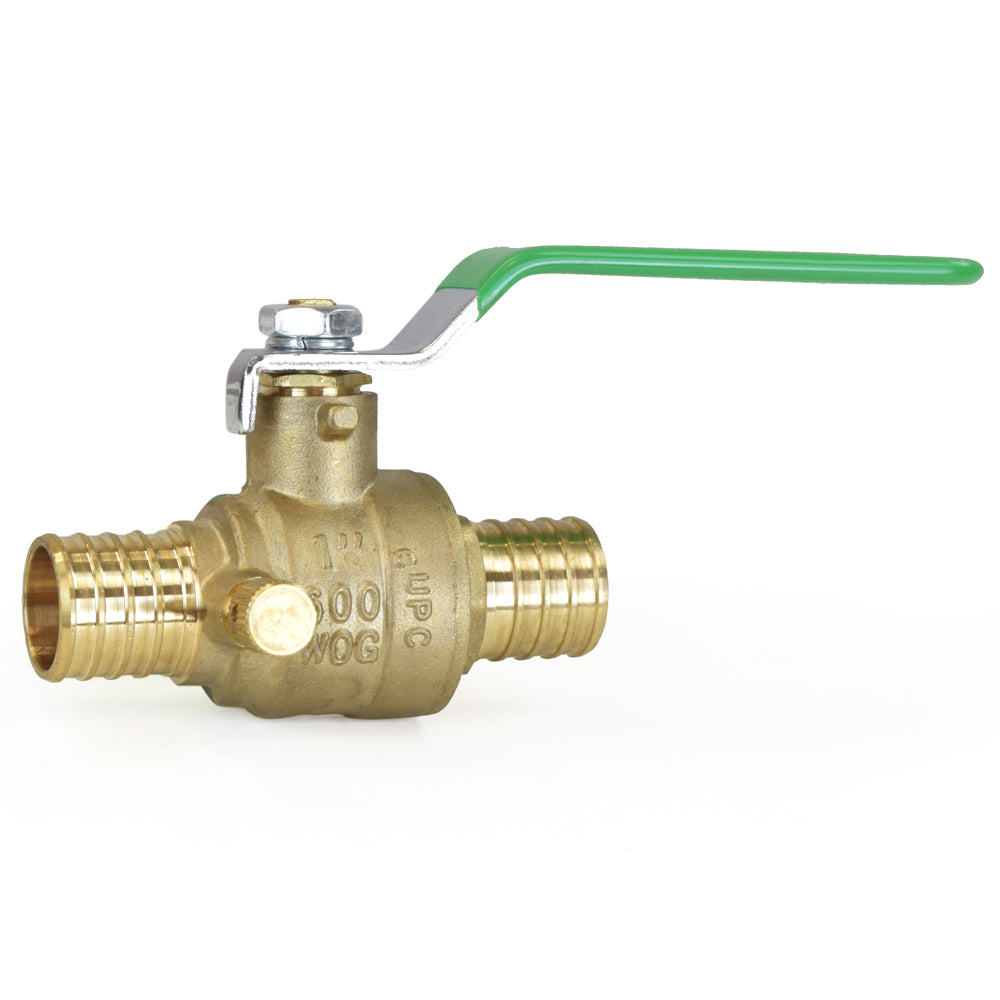 a brass ball valve with a green handle