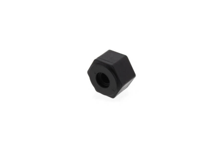 a black hex nut on a white background