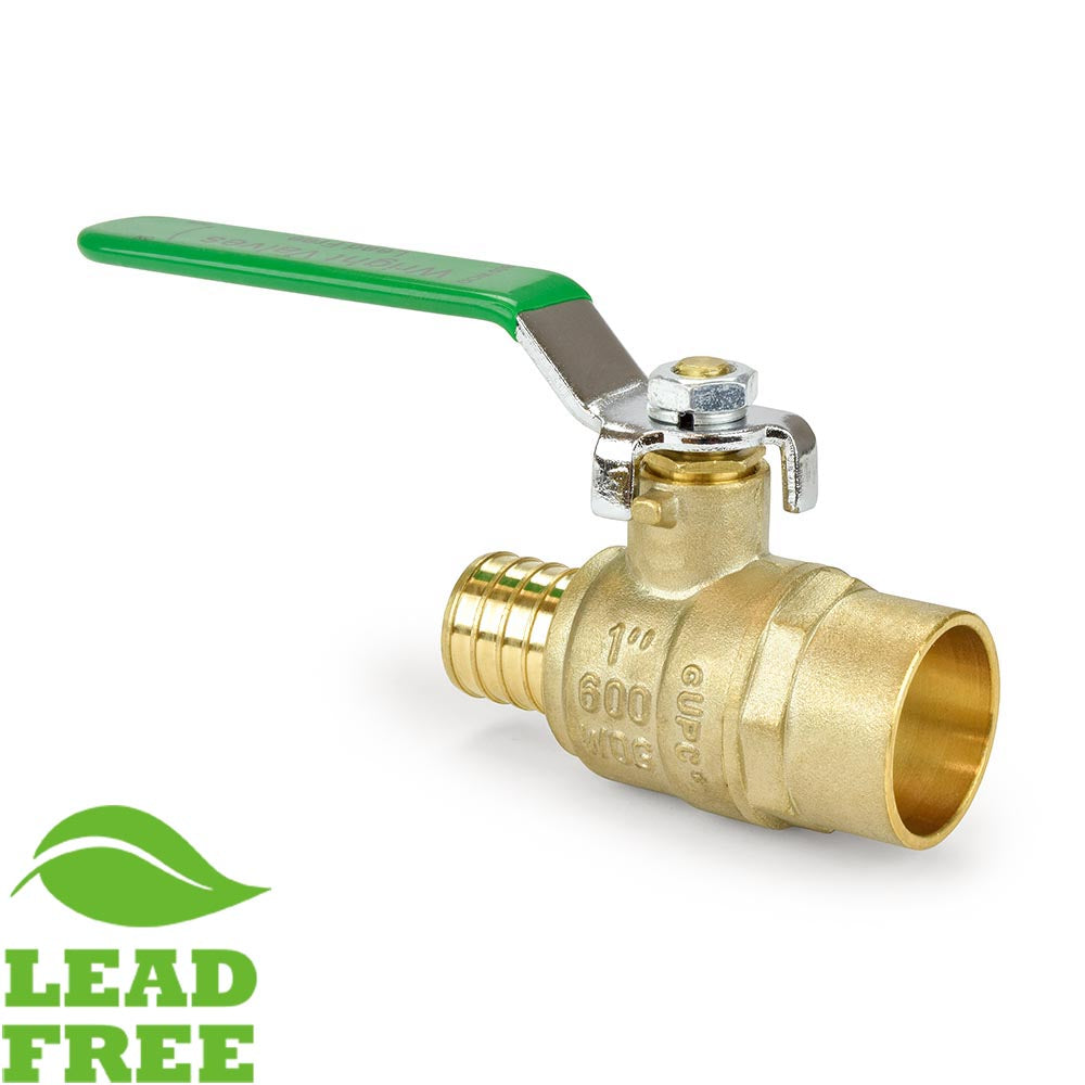 a brass ball valve with a green handle