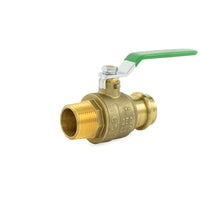 a brass ball valve with a green handle