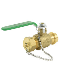 a brass ball valve with a green handle