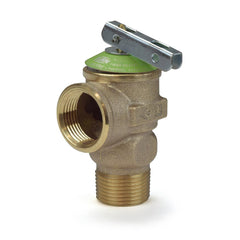 a brass ball valve with a green handle