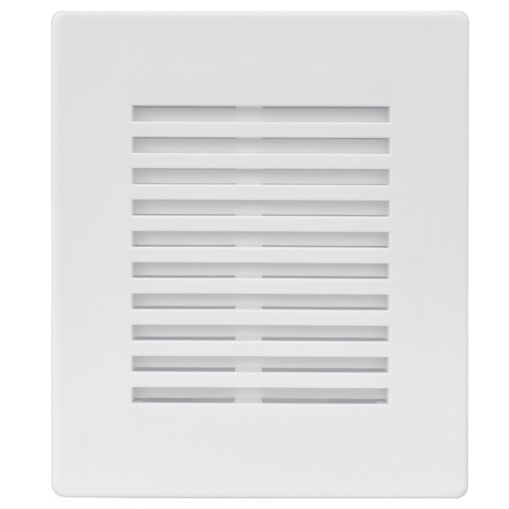 a close up of a white vent on a wall