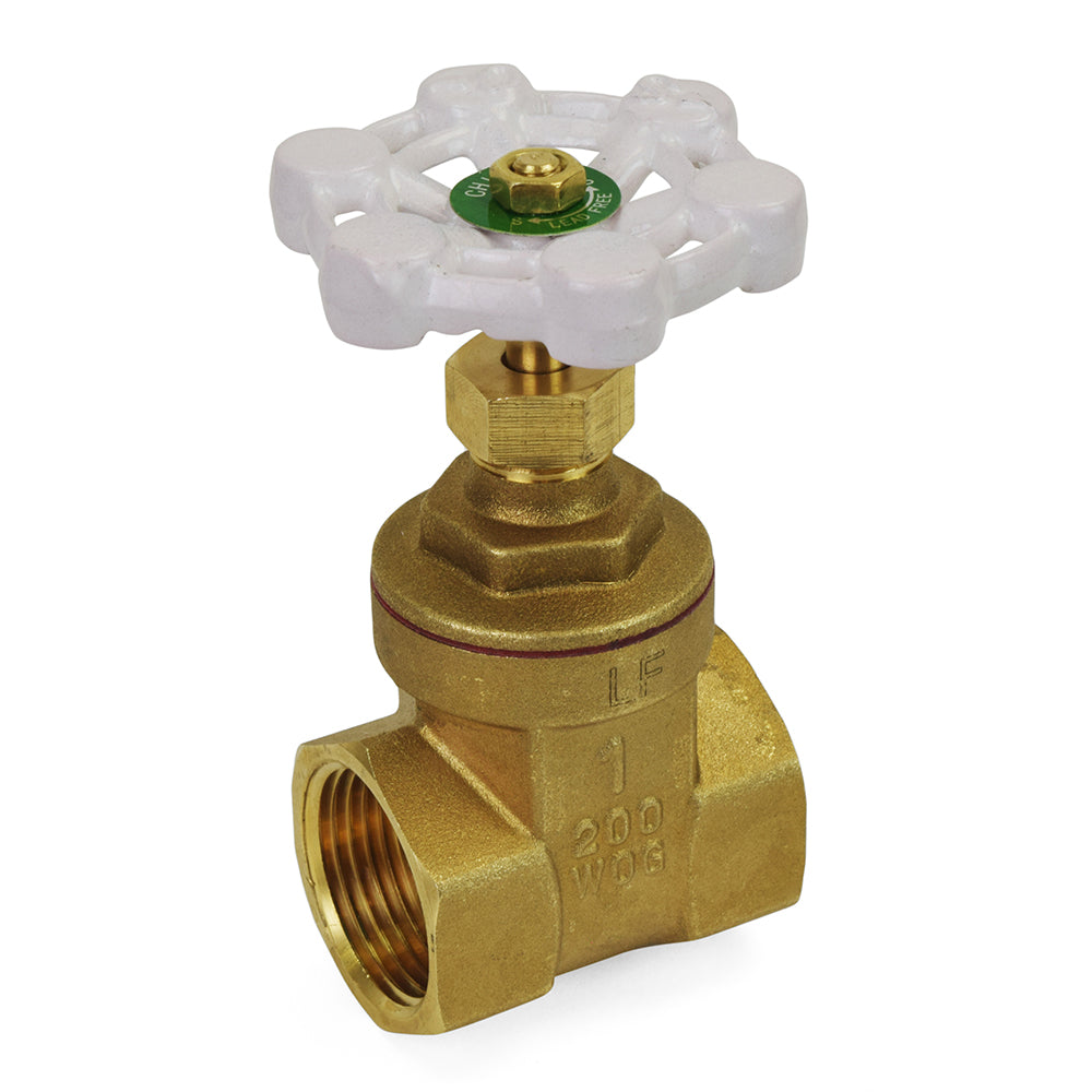 a brass ball valve with a green top