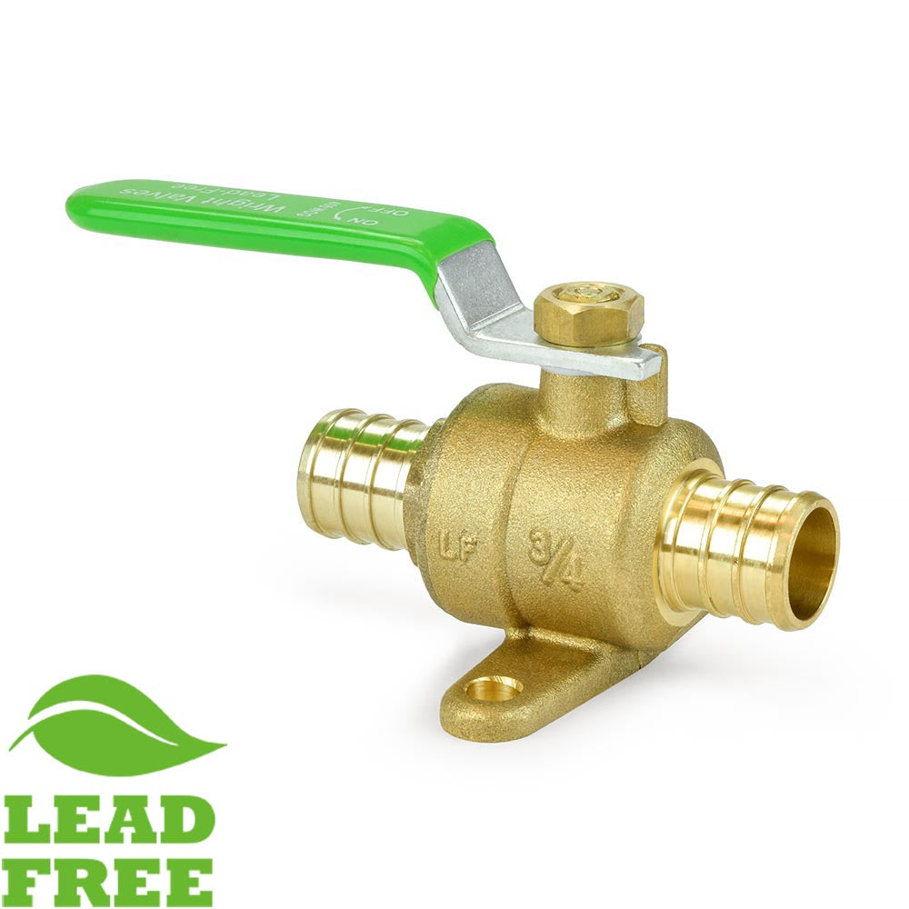 a brass ball valve with a green handle