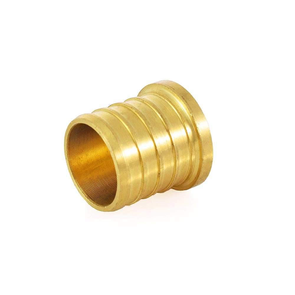 a brass plated brass fitting on a white background