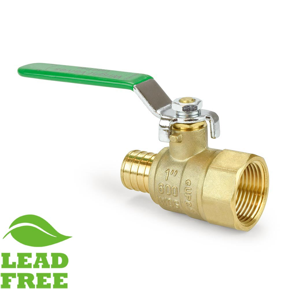 a brass ball valve with a green handle